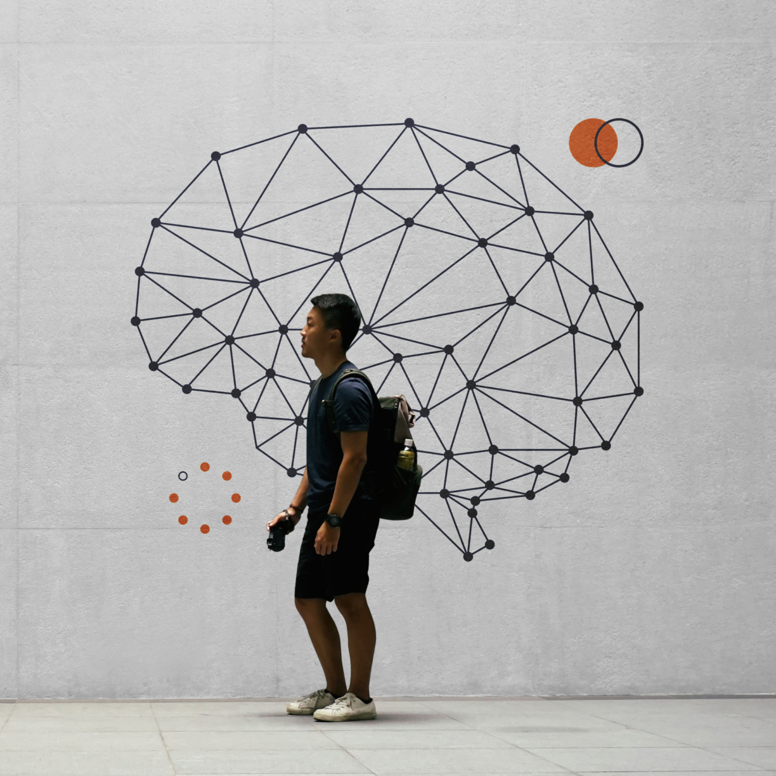 man walking past brain graphic