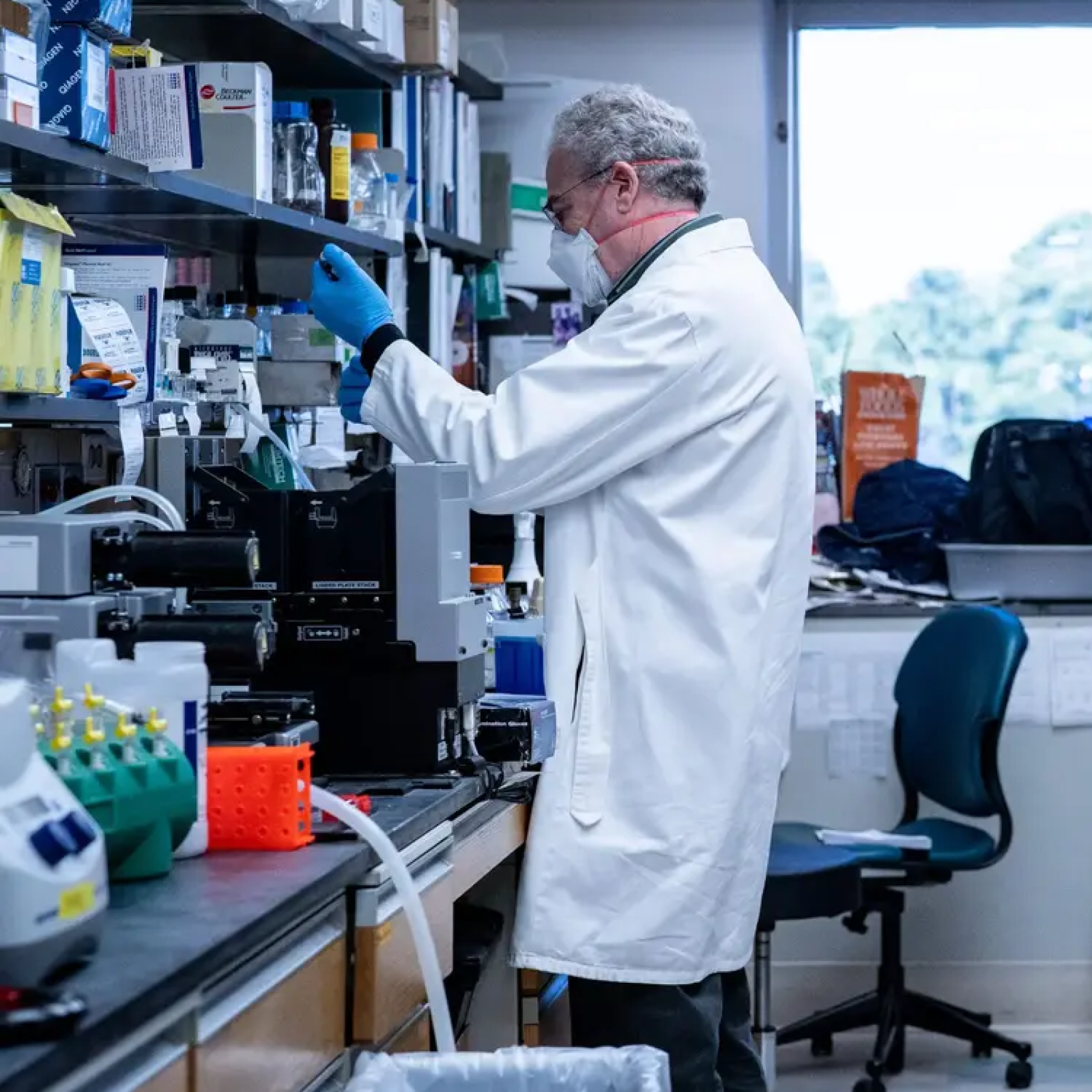 Researcher in white lab coat