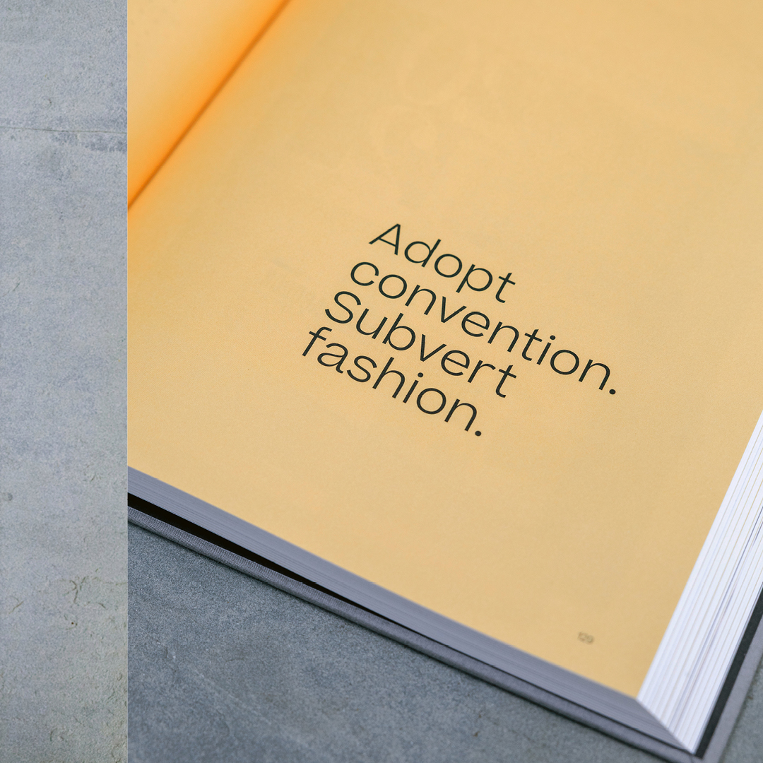adopt convention. subvert fashion